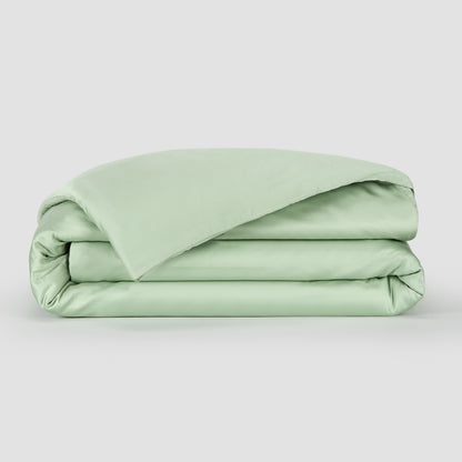 Capa de edredão Verde bambu by Momo Cotton – tecido de cetim 300 fios, suave, respirável e sustentável.
