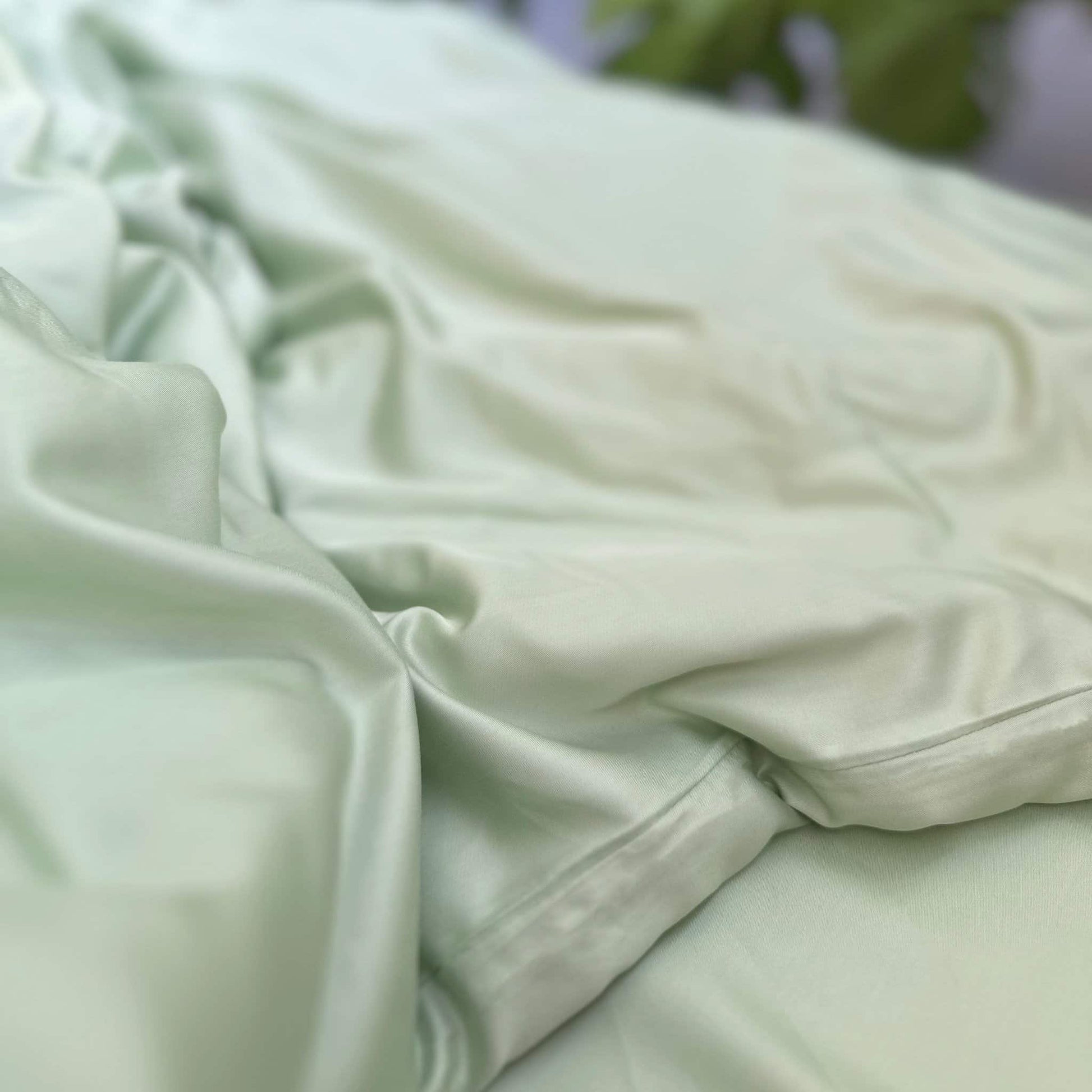 Close-up of green bamboeweefsel texture – zacht, ademend en duurzaam beddengoed material