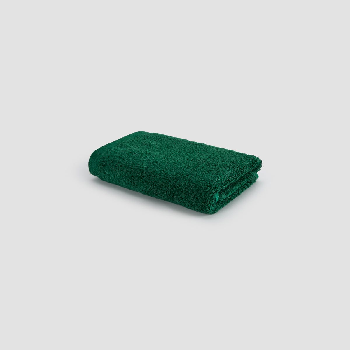 Toalha de rosto verde em bambu da Momo Cotton – macia, absorvente, seca rápido e sustentável