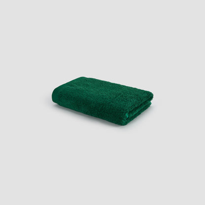 Toalha de rosto verde em bambu da Momo Cotton – macia, absorvente, seca rápido e sustentável