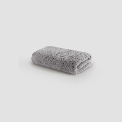 Toalha de rosto cinzento em bambu da Momo Cotton – macia, absorvente, seca rápido e sustentável